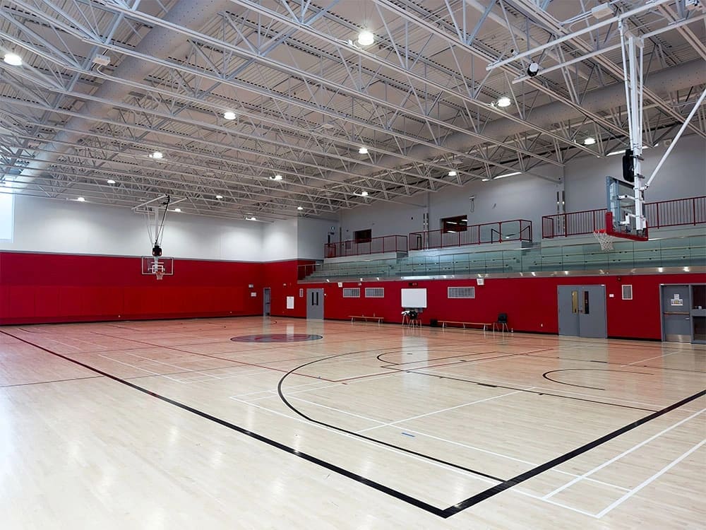 The spacious gym at Collège André-Grasset is a great place to join open play volleyball games outside of school hours